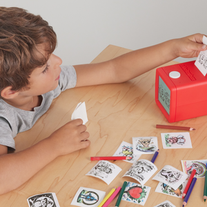 A five year-old getting stickers printed from stickerbox. 