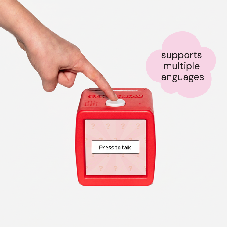 A hand pressing on Sticker's button and the screen says 'Press to talk'. Next to it, there is a 'supports multiple languages' in a pink speech bubble.